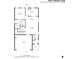 Detailed first-floor plan with living room, kitchen, primary bedroom, garage, and outdoor patio layout at 2431 Thoreau Ln, Charleston, SC 29406