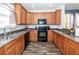 Charming kitchen with wood cabinets, modern appliances, and ample counter space for meal preparation at 2431 Thoreau Ln, Charleston, SC 29406