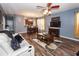 Bright living room with fireplace, dining area, modern decor, and comfortable furnishings at 2431 Thoreau Ln, Charleston, SC 29406