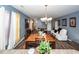 Open-concept living space features a dining area, living room, and stylish decor, perfect for entertaining guests at 2431 Thoreau Ln, Charleston, SC 29406