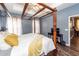 Comfortable main bedroom featuring a four-poster bed, TV, and ample closet space for a cozy and organized living at 2431 Thoreau Ln, Charleston, SC 29406