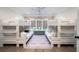 Bright room with four bunk beds and a neutral color scheme, perfect for or guests at 2501 Clear Marsh Rd, Seabrook Island, SC 29455