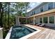 Inviting pool with a wooden deck area and lounge chairs for relaxation at 2501 Clear Marsh Rd, Seabrook Island, SC 29455