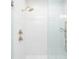 Modern shower with white vertical subway tiles and dual shower heads at 2501 Clear Marsh Rd, Seabrook Island, SC 29455