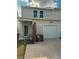 Two-story home featuring a two-car garage, vinyl siding, and updated landscaping at 280 Godwit Dr, Summerville, SC 29486