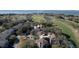 Beautiful aerial view of 3005 Ocean Villas overlooking a golf course, ponds, and the Island Club at 3005 Ocean Winds Dr, Seabrook Island, SC 29455