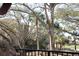 Balcony view of the golf course and mature trees with Spanish moss at 3005 Ocean Winds Dr, Seabrook Island, SC 29455