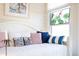 Cozy bedroom nook featuring a stained glass window and inviting decor at 3005 Ocean Winds Dr, Seabrook Island, SC 29455