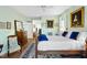 Spacious bedroom featuring a queen-size bed, hardwood floors, and natural light, offering a comfortable space at 3005 Ocean Winds Dr, Seabrook Island, SC 29455