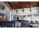 Restaurant interior with booths, tables, woodwork, wood beams, chandeliers and a beautiful blue color scheme at 3005 Ocean Winds Dr, Seabrook Island, SC 29455