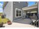 Backyard showing a patio with seating and grill, window, and siding at 3020 Plumier Pl, Charleston, SC 29414