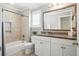 Full bathroom with vanity, shower over tub, and natural light at 3020 Plumier Pl, Charleston, SC 29414