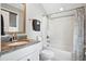 Clean bathroom with granite vanity, toilet, and tub with shower at 3020 Plumier Pl, Charleston, SC 29414