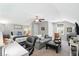 Spacious bedroom with a queen bed, a desk, a sofa, and a ceiling fan at 3020 Plumier Pl, Charleston, SC 29414
