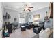 Inviting bedroom designed as a music room with instruments, comfortable seating, and stylish decor at 3020 Plumier Pl, Charleston, SC 29414