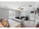 Spacious bedroom featuring a ceiling fan, neutral decor, and a closet at 3020 Plumier Pl, Charleston, SC 29414