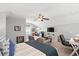 Bright bedroom offering ample living space, ceiling fan, sofa, and desk area at 3020 Plumier Pl, Charleston, SC 29414