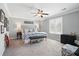 Cozy bedroom featuring warm carpet, a ceiling fan, and decorative furnishings at 3020 Plumier Pl, Charleston, SC 29414
