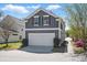 Two-story home with garage and well-manicured landscaping at 3020 Plumier Pl, Charleston, SC 29414