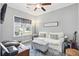 Bright sitting room with comfortable seating, natural light, and relaxing ambiance at 3020 Plumier Pl, Charleston, SC 29414
