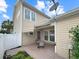 Exterior view of the backyard patio with awning, showcasing outdoor living and architectural details at 3025 Lazarette Ln, Charleston, SC 29414