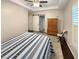 Bedroom boasts natural light, features an en-suite bathroom, and ample closet space for storage at 3025 Lazarette Ln, Charleston, SC 29414