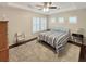 Comfortable bedroom with ample natural light, neutral walls, tray ceiling, and ceiling fan at 3025 Lazarette Ln, Charleston, SC 29414