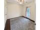 Well-lit bedroom features neutral walls, stylish rug, and private patio access at 3025 Lazarette Ln, Charleston, SC 29414