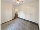 Comfortable bedroom with ceiling fan, plush rug, and adjoining staircase at 3025 Lazarette Ln, Charleston, SC 29414