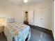 Inviting bedroom featuring a fan, quilt bedding, closet, and adjoining bathroom at 3025 Lazarette Ln, Charleston, SC 29414
