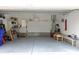 Attached garage with ample storage space, including shelves, work bench, and plenty of open area at 3025 Lazarette Ln, Charleston, SC 29414