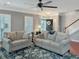 Comfortable living room featuring hardwood floors, gray walls, and neutral furniture at 3025 Lazarette Ln, Charleston, SC 29414