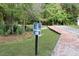 Jasmine Bolton's Landing Walking Trail sign, pathway, and landscape at 3025 Lazarette Ln, Charleston, SC 29414