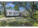 Side exterior view showing carport, the back, the roof, and other home features at 311 Black St, Walterboro, SC 29488