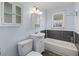 Updated bathroom with modern fixtures, a white vanity, and a shower-tub combo at 311 Black St, Walterboro, SC 29488