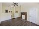 Spacious living room featuring dark wood floors and abundant natural light for a warm and inviting atmosphere at 311 Black St, Walterboro, SC 29488