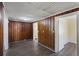 Versatile room with rich wood paneling and updated flooring at 311 Black St, Walterboro, SC 29488