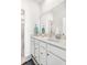 Neutral bathroom with white cabinetry, quartz countertop and decorative elements at 316 Archar St, Summerville, SC 29486