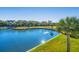 Panoramic aerial showcasing a scenic lake surrounded by lush foliage and stunning homes at 3419 Myrtle St, Edisto Island, SC 29438