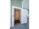 Convenient residential elevator featuring wood-paneled interior, providing easy access to different floors at 3419 Myrtle St, Edisto Island, SC 29438