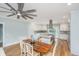 Bright and airy kitchen and dining area featuring stainless steel appliances and an island at 3419 Myrtle St, Edisto Island, SC 29438