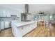 Large kitchen island with range, with stainless appliances and an open concept at 3419 Myrtle St, Edisto Island, SC 29438