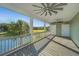 Spacious outdoor porch overlooking a beautiful green space with ceiling fans installed at 3419 Myrtle St, Edisto Island, SC 29438
