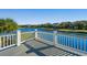 Beautiful outdoor porch featuring a picturesque view of a serene lake at 3419 Myrtle St, Edisto Island, SC 29438