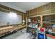 Organized storage room with a workbench, shelving, tools and ample space for storing equipment and supplies at 3419 Myrtle St, Edisto Island, SC 29438