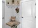 Entryway with bench seating, coat hooks, and decorative accents; a seamless blend of function and charm at 345 Turnstone St, Mount Pleasant, SC 29464