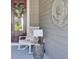Inviting covered front porch with rocking chair and stylish decor at 345 Turnstone St, Mount Pleasant, SC 29464