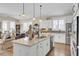 Spacious kitchen with marble countertops, gas range, stainless steel appliances, and an open layout at 345 Turnstone St, Mount Pleasant, SC 29464