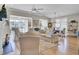 Open-concept living room with ceiling fan, natural light, and comfortable seating at 345 Turnstone St, Mount Pleasant, SC 29464