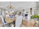 Spacious open-concept living space with a dining area, kitchen, and cozy seating at 345 Turnstone St, Mount Pleasant, SC 29464